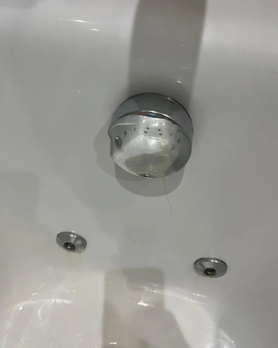 Bath overflow filler after cleaning by Stay Flow Cleaners