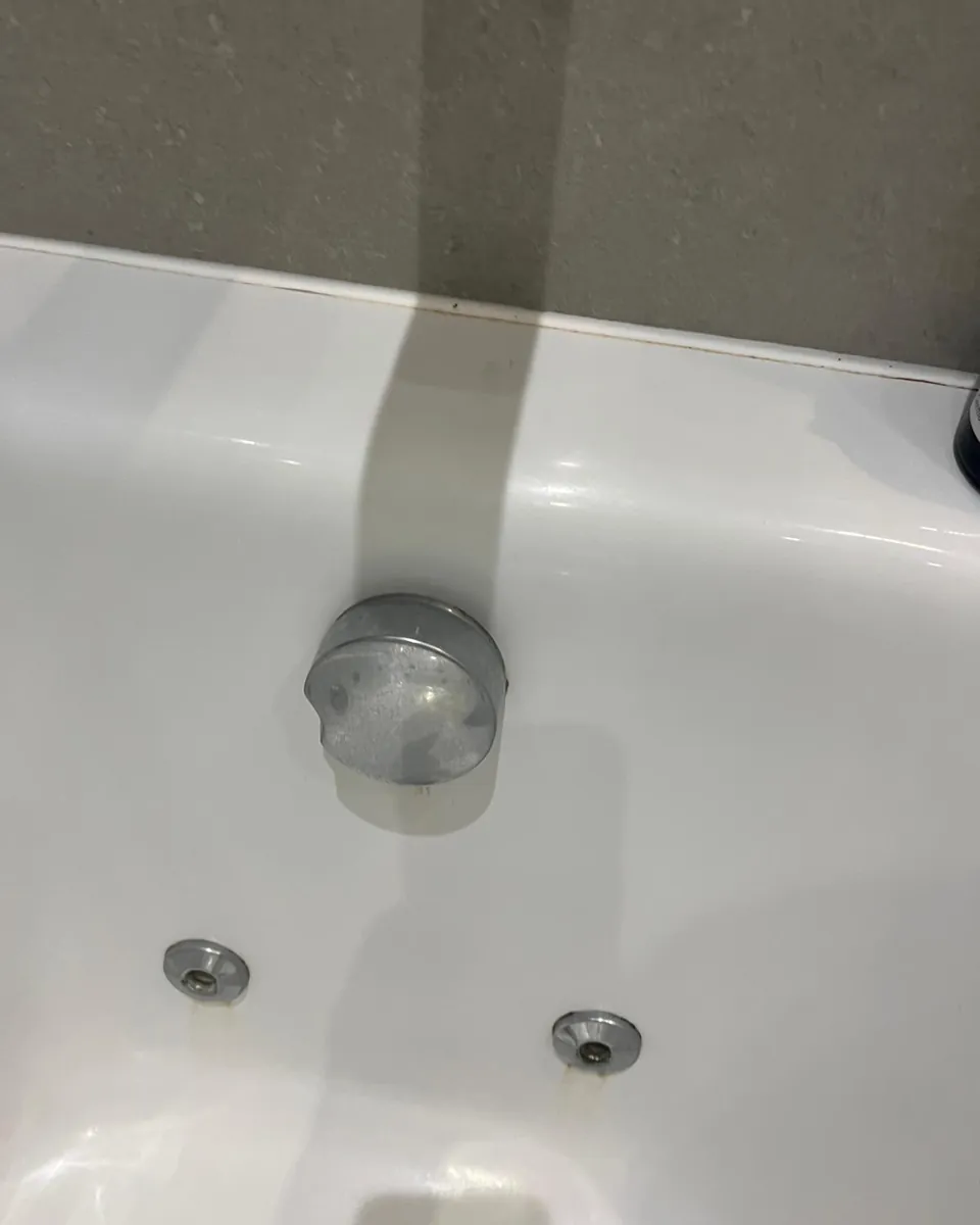 Bath overflow filler before cleaning