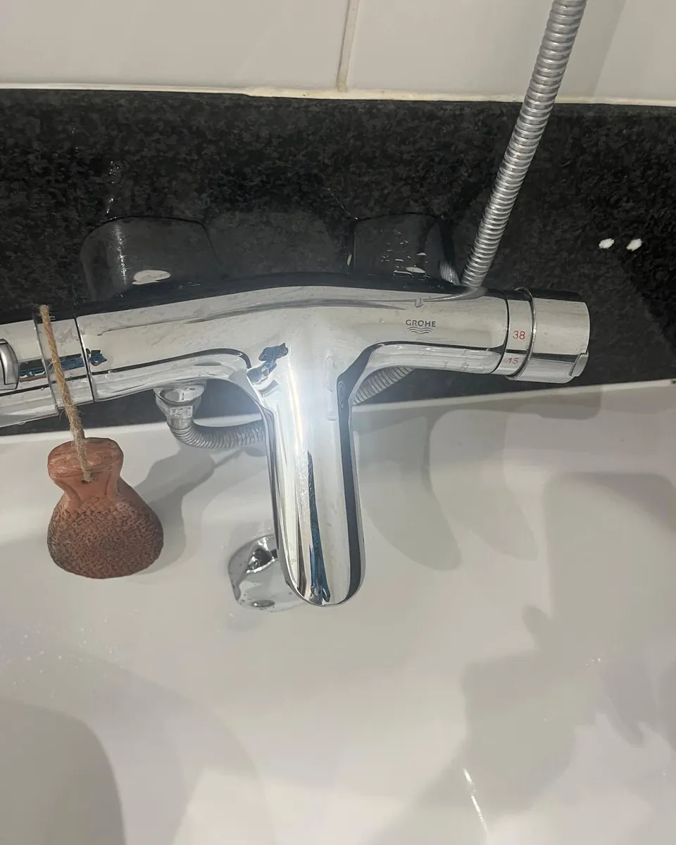 Bath mixer tap after cleaning by Stay Flow Cleaners